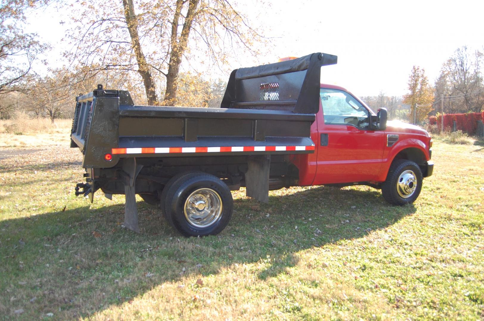 2008 RED /Grey Vinyl Ford F-350 SD XL DRW 4WD (1FDWF37R68E) with an 6.4L V8 OHV 32V TURBO DIESEL engine, Manual transmission, located at 6528 Lower York Road, New Hope, PA, 18938, (215) 862-9555, 40.358707, -74.977882 - This vehicle has a reconstructed title. Here we have a 2008 Ford F350 dump body with a 6.4L V8 Diesel engine putting power to the ground via a manual shifting 4X4 transmission. The interior offers grey leather, AC/HEAT, AM/FM radio, roll up windows and front airbags for safety. The exterior offers r - Photo#7